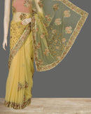 Elegant Beige Color Net Sari with Bootis and Embroidery Work