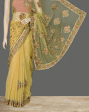 Elegant Beige Color Net Sari with Bootis and Embroidery Work