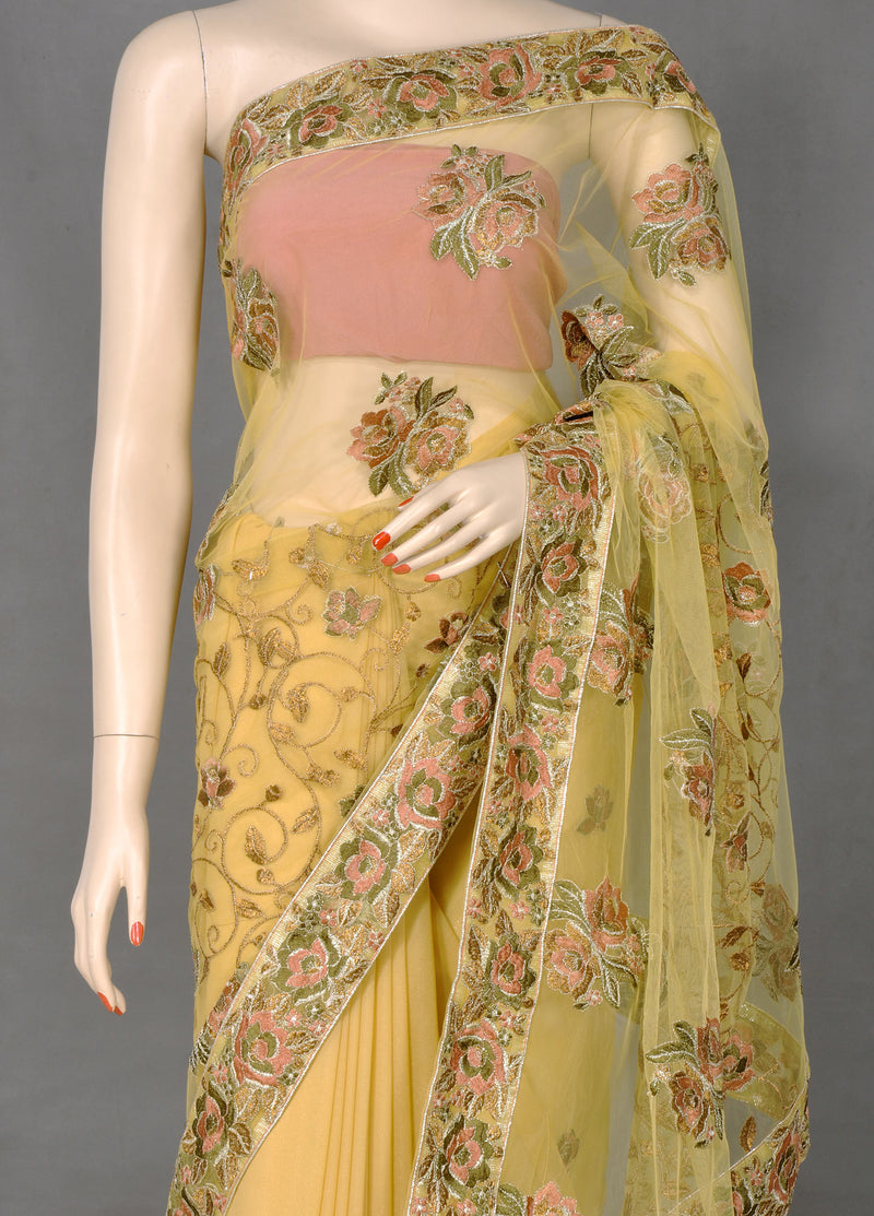 Elegant Beige Color Net Sari with Bootis and Embroidery Work