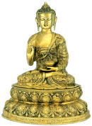 Buddha with 'life of buddha' carving on his robe